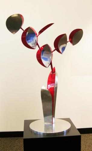 Lin Emery (American, b. 1928). Maquette for Flowering, 1994. Polished aluminum with red urethane paint, 54x36in. Leepa-Rattner Museum of Art, St. Petersburg College, gift of The Patricia A. And Thomas J. Lehnen Family Art Collection, 2006.10